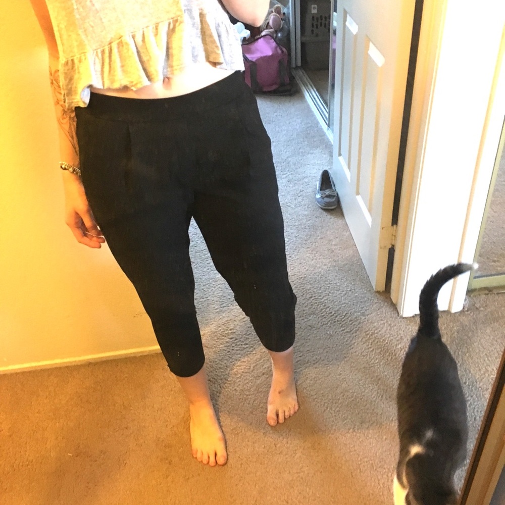 Black cutoff slacks